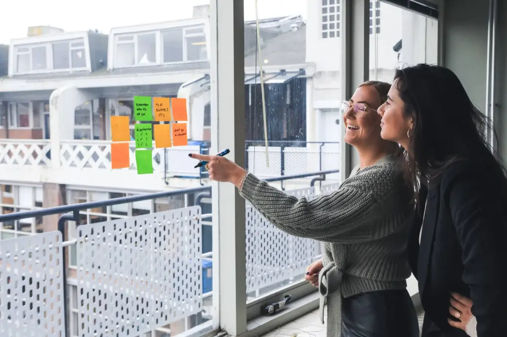 Two women working to earn $84,000 a year.